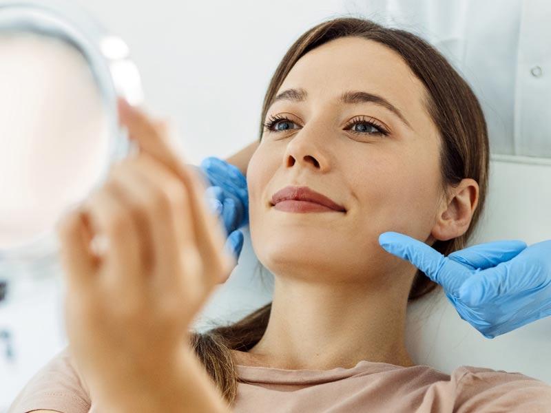 Woman getting cosmetic procedure